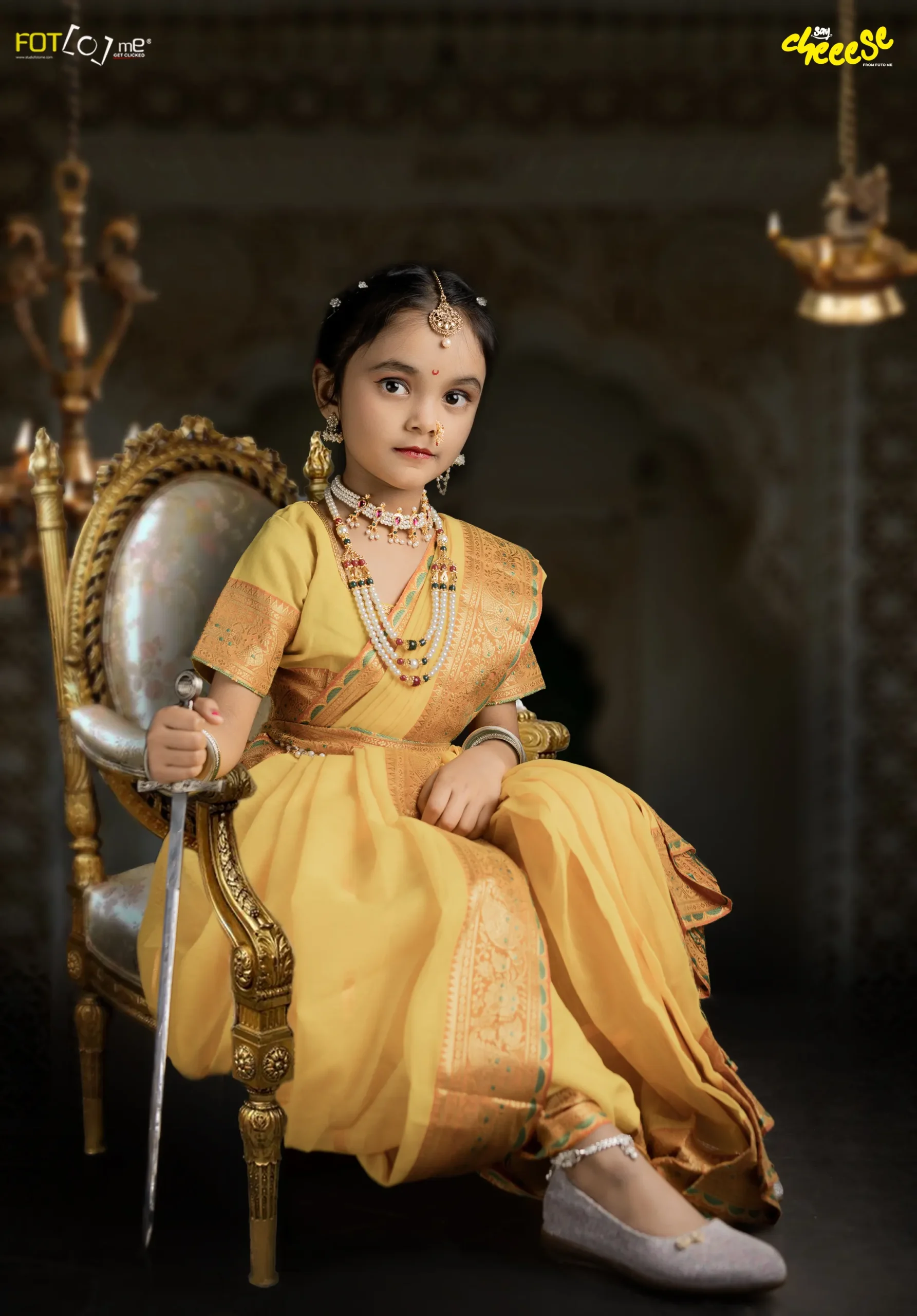 Toddler posing confidently during a creative kids fashion photoshoot at Say Cheese by Foto Me studio in Ranchi
